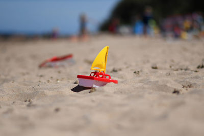 Close-up of toy on sand