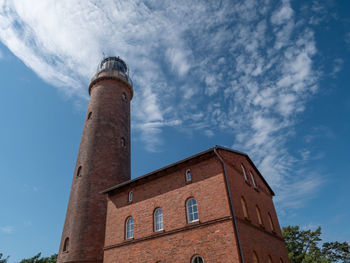 Low angle view of smoke stack against sky