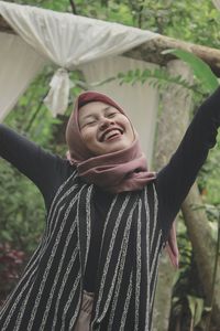 Portrait of a smiling young woman