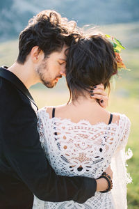 Couple embracing outdoors