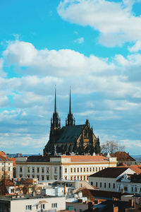 Buildings in city against sky