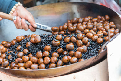 High angle view of person preparing food in container