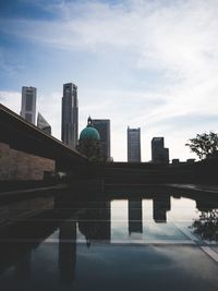 View of city against cloudy sky