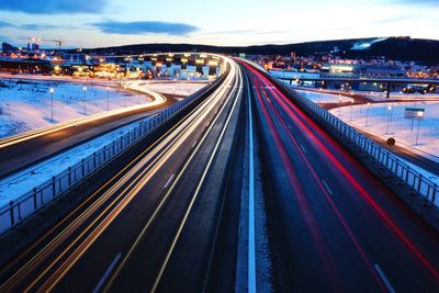 High angle view of light trails on railroad tracks