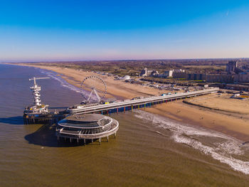 High angle view of road by sea against sky