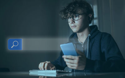 Young woman using mobile phone