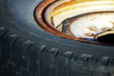 Tire discarded with rusting rim