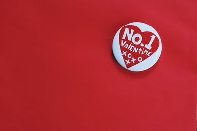 Close-up of heart shape on red background