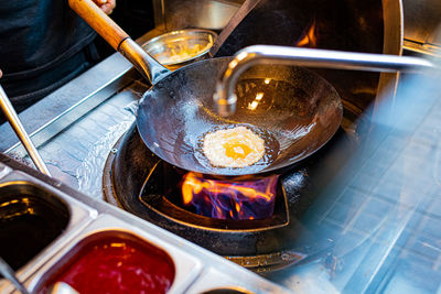 High angle view of fire in kitchen