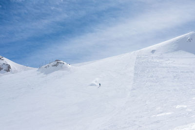 Scenic view of snowcapped mountain against sky