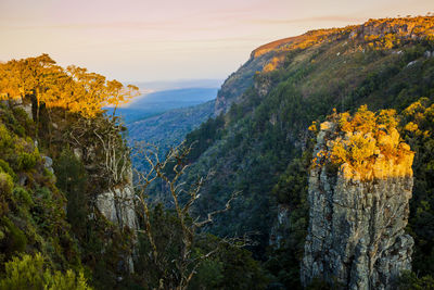 Scenic view of mountains against sky during sunset