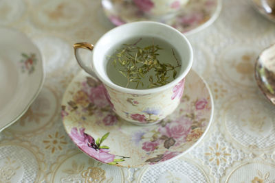 Close-up of herbal tea served on table