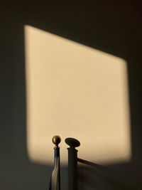 Close-up of lamp against wall