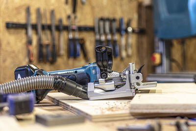 Close-up of machine part on table