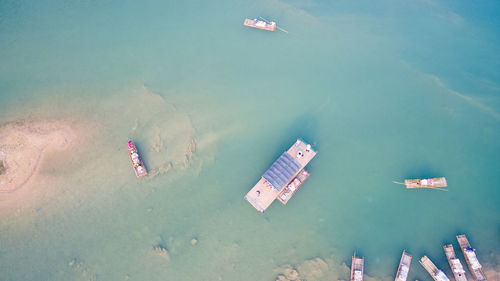 High angle view of people on boat in sea