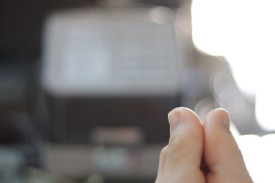 Close-up of person holding hands