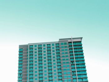 Low angle view of modern building against clear sky