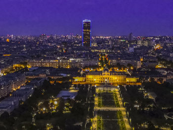 High angle view of illuminated city buildings at night