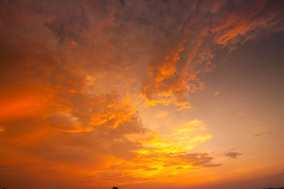 Low angle view of dramatic sky during sunset