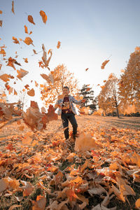 Full length of man during autumn against sky