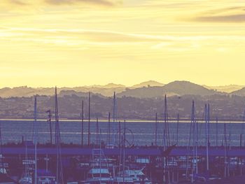 Scenic view of mountains against sky at sunset