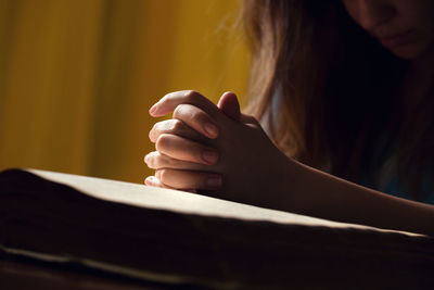 Close-up of hand holding hands at home