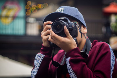 Portrait of man photographing