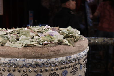 Close-up of stack of objects on table