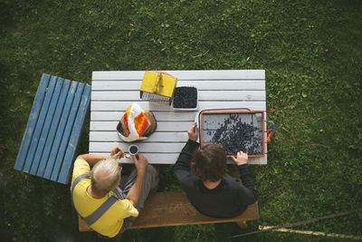 Couple sitting outside