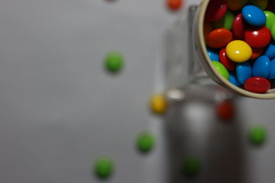 High angle view of multi colored balls on table