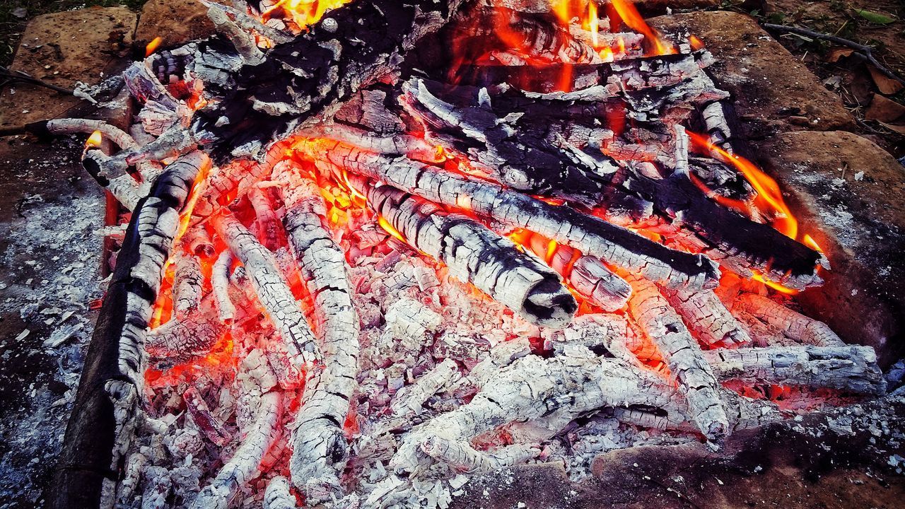 HIGH ANGLE VIEW OF BONFIRE