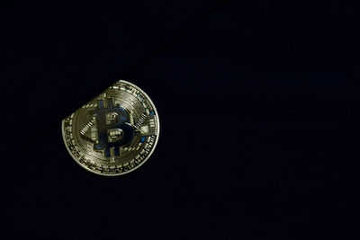 High angle view of electric lamp against black background