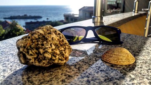 Close-up of sunglasses on table