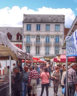 Group of people in front of building