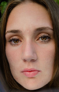 Close-up portrait of young woman