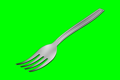 Close-up of fork over white background