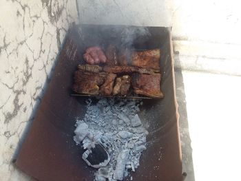 Close-up of meat on barbecue grill