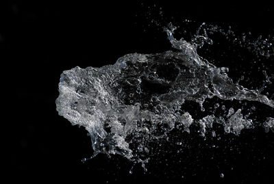 Close-up of moon over black background