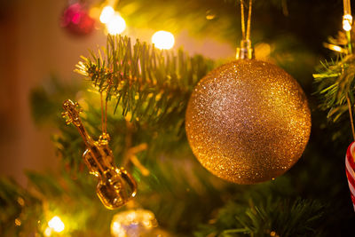 Close-up of christmas decoration hanging on tree