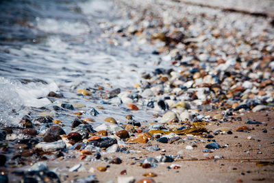 Close-up of pebbles on beach