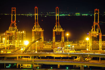 Illuminated buildings in city at night