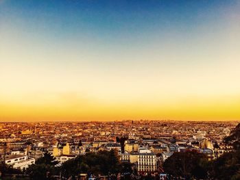 High angle view of cityscape at sunset