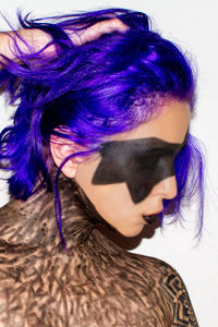 Portrait of woman with purple hair