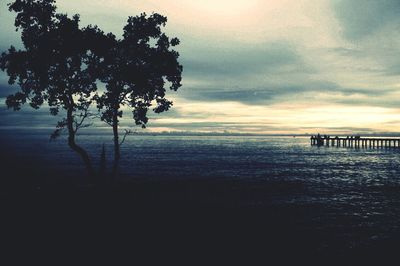 Scenic view of sea at sunset