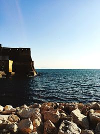 Scenic view of sea against clear sky