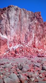 Rocks on mountain against clear sky