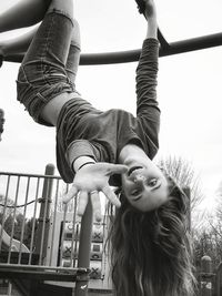 Low angle view of woman against sky