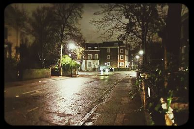 Illuminated street lights at night