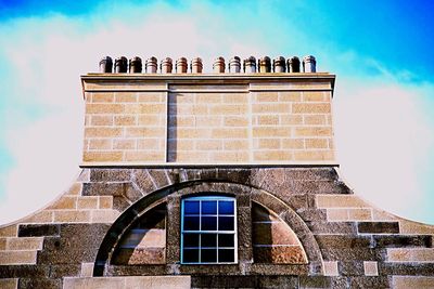 Low angle view of historic building against sky