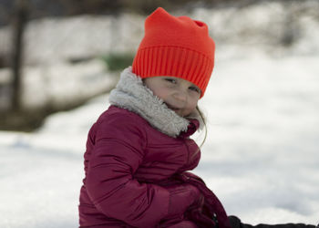 Full length of girl wearing hat during winter